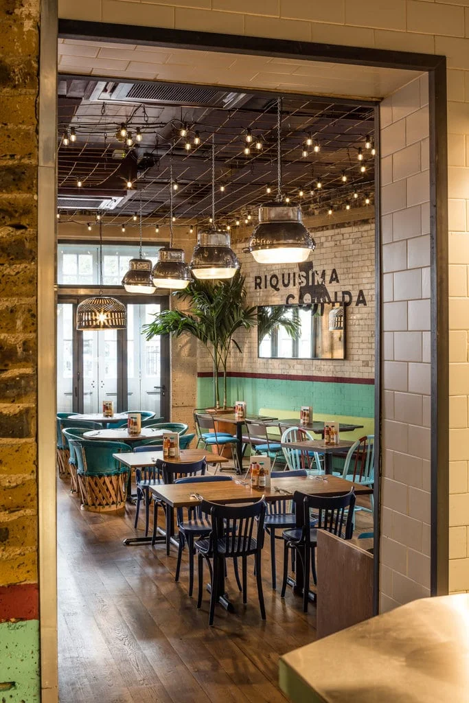 Light and welcoming interior of Wahaca Shoreditch