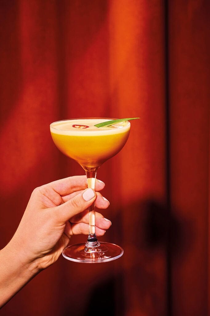 an alcohol free cocktail made with pineapple, passionfruit and chilli, a perfect choice for dry january, sober october or people looking for alcohol alternatives.